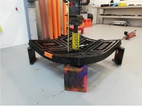 Workdek panel sample showing deflection after a central load test