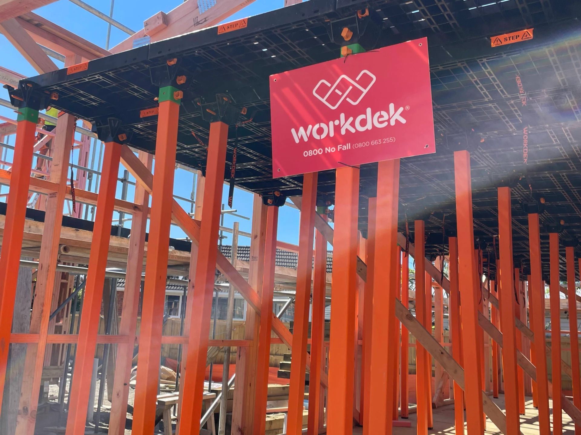 Workdek platform installed on site with branded safety signage