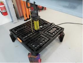 Tested Workdek panel sample showing local grill buckling